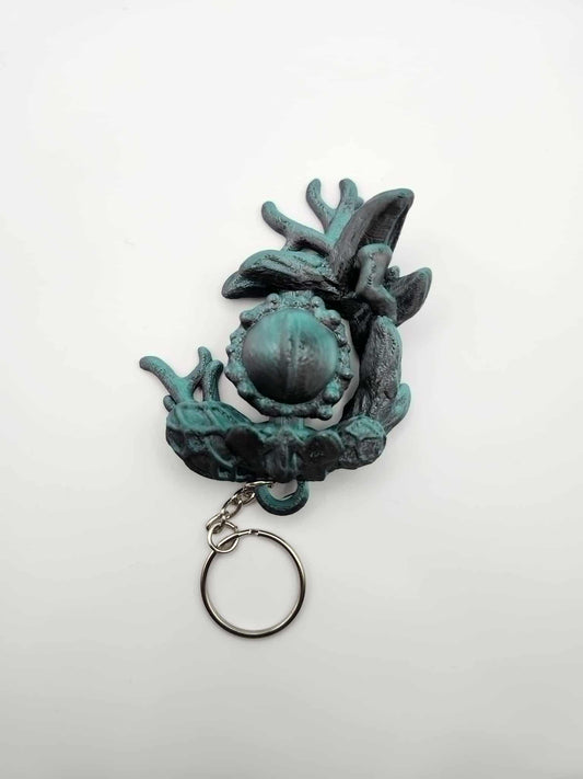 Infested Dragon Spinner Tail Keychain